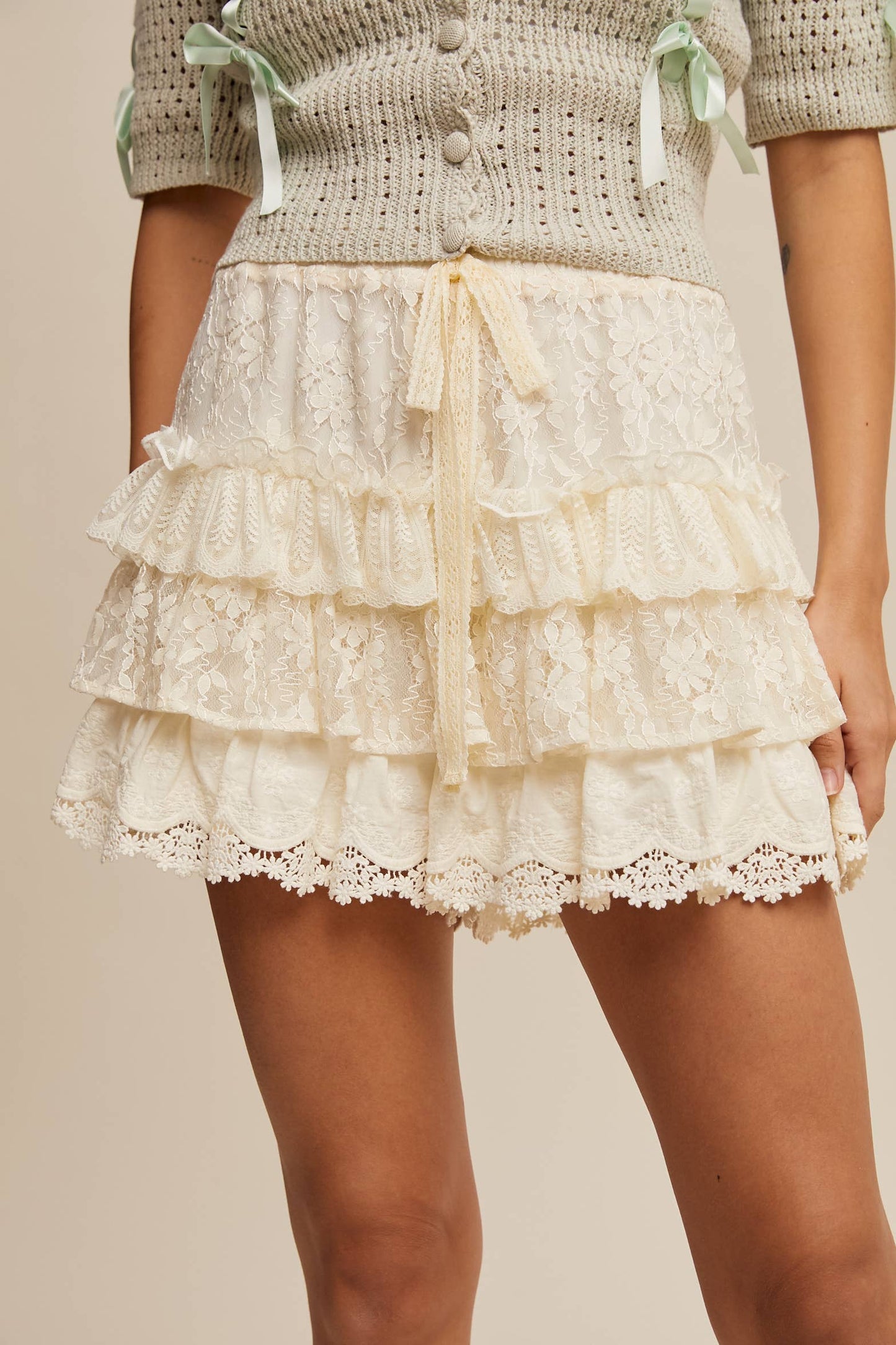 A New Arrival                   Lace Tiered Shorts with Ruffle Details: Cream
