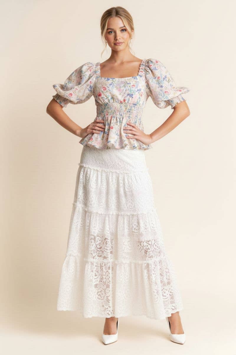 A New Arrival              FLORAL PRINT PEPLUM TOP
