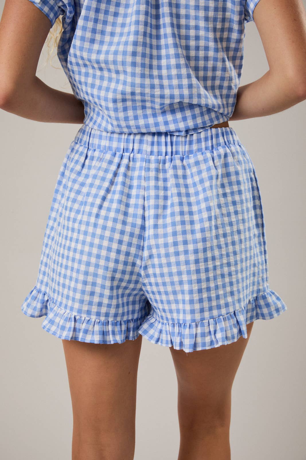 RUFFLE DETAIL SHORTS: BLUE-WHITE GINGHAM