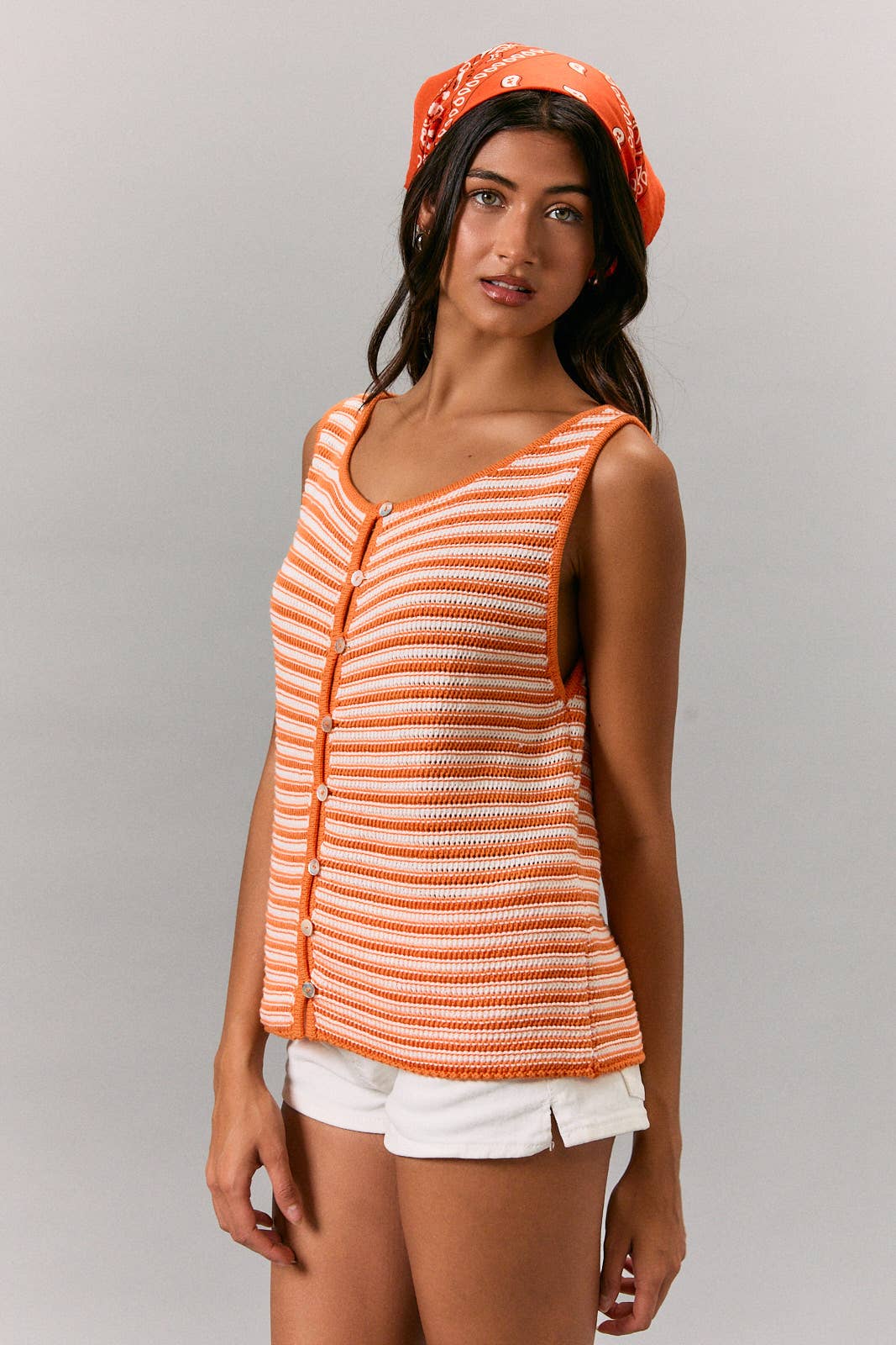 A New Arrival BOAT NECK SLEEVELESS BUTTON FRONT CROCHET EFFECT TOP: ORANGE-CREAM STRIPE