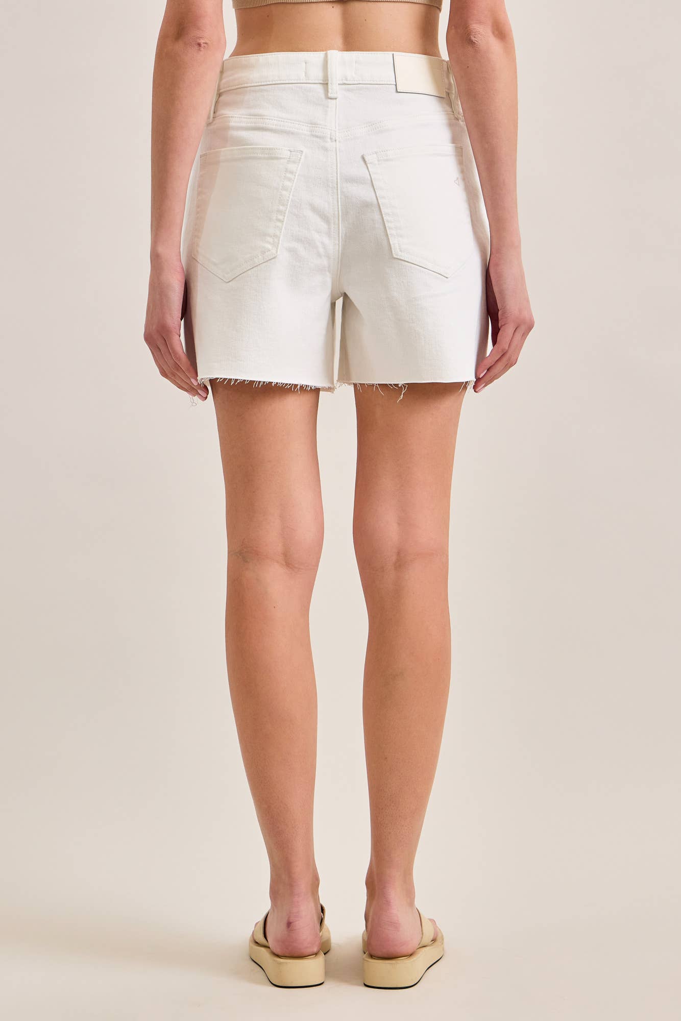 A New Arrival                       5” INSEAM HIGH RISE AVA A-LINE SHORTS