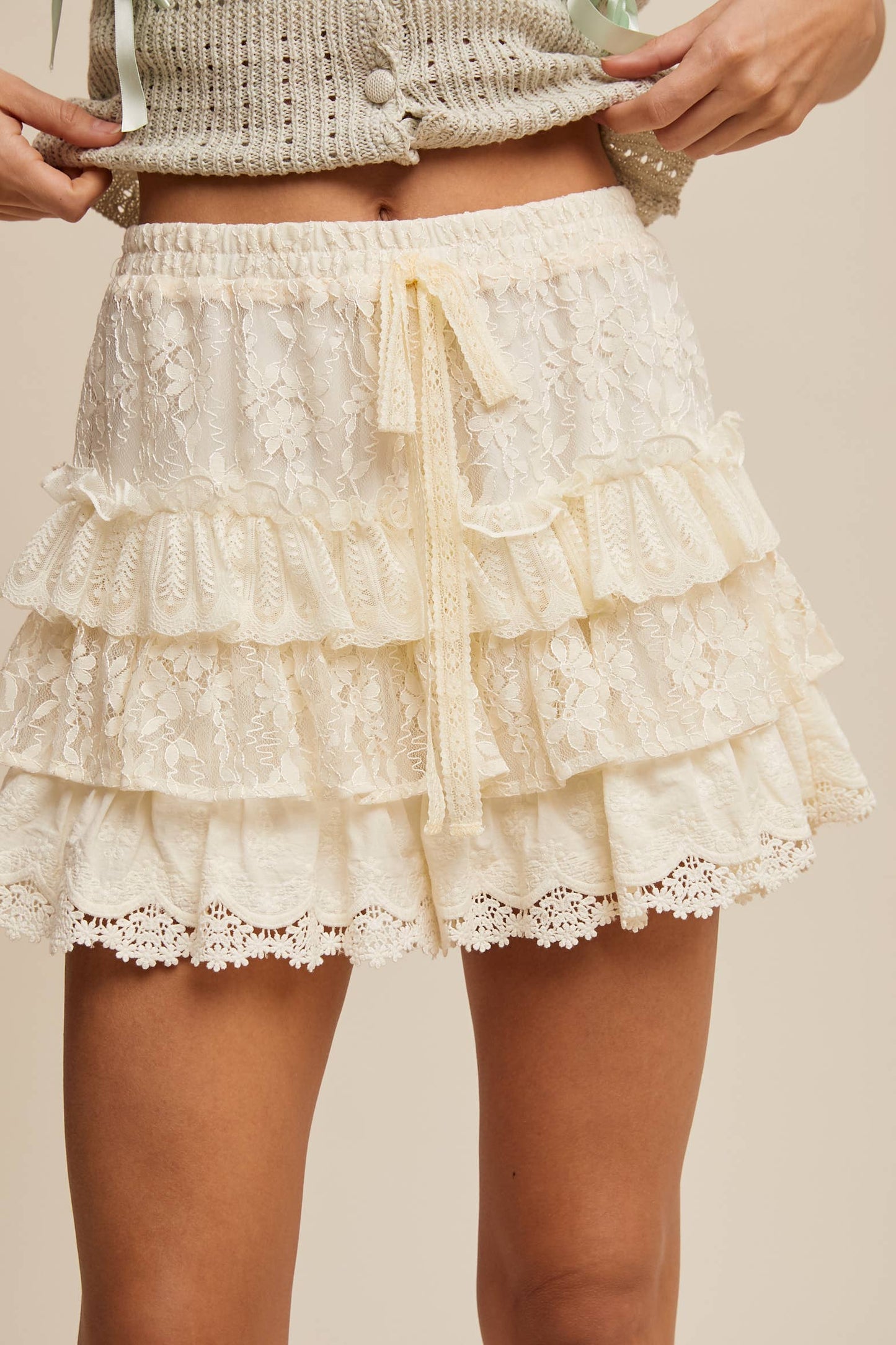 A New Arrival                   Lace Tiered Shorts with Ruffle Details: Cream