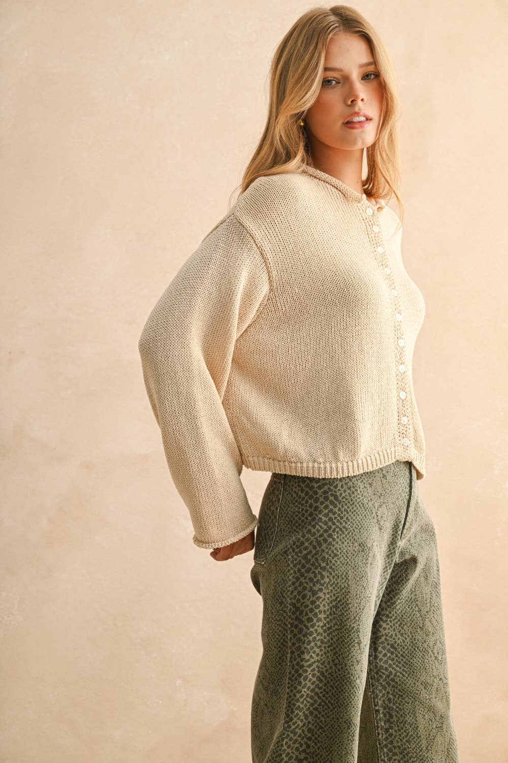 A New Arrival                LIGHT WEIGHT BUTTON FRONT CARDIGAN: CREAM
