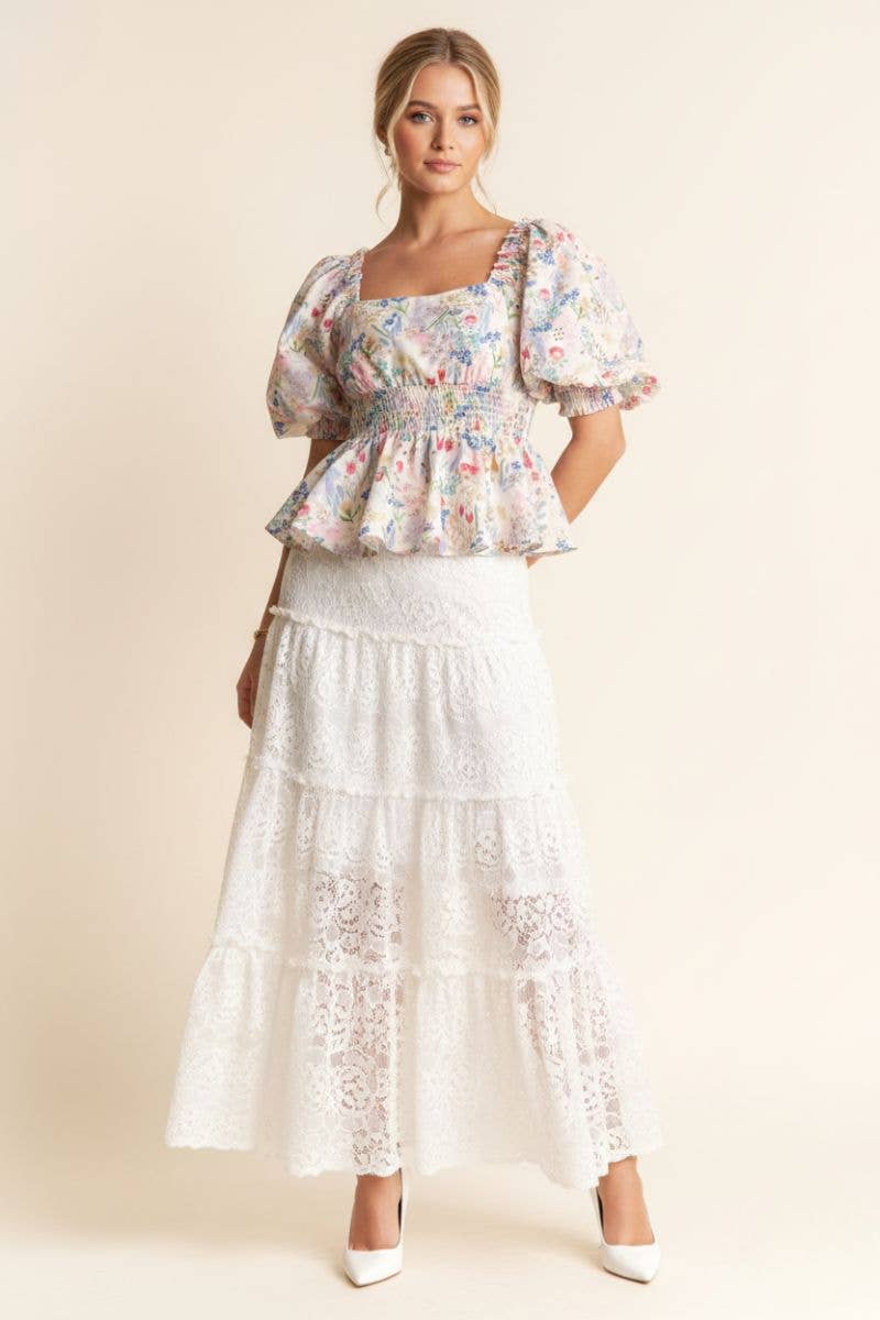 A New Arrival              FLORAL PRINT PEPLUM TOP